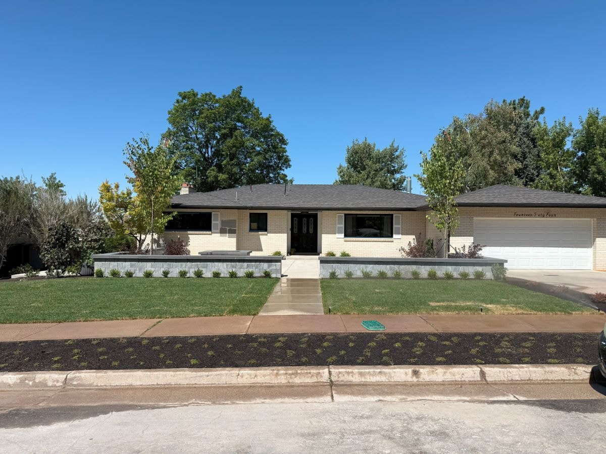 Belgard retaining walls, concrete patio and landscape plantings — Salt Lake City, Utah
