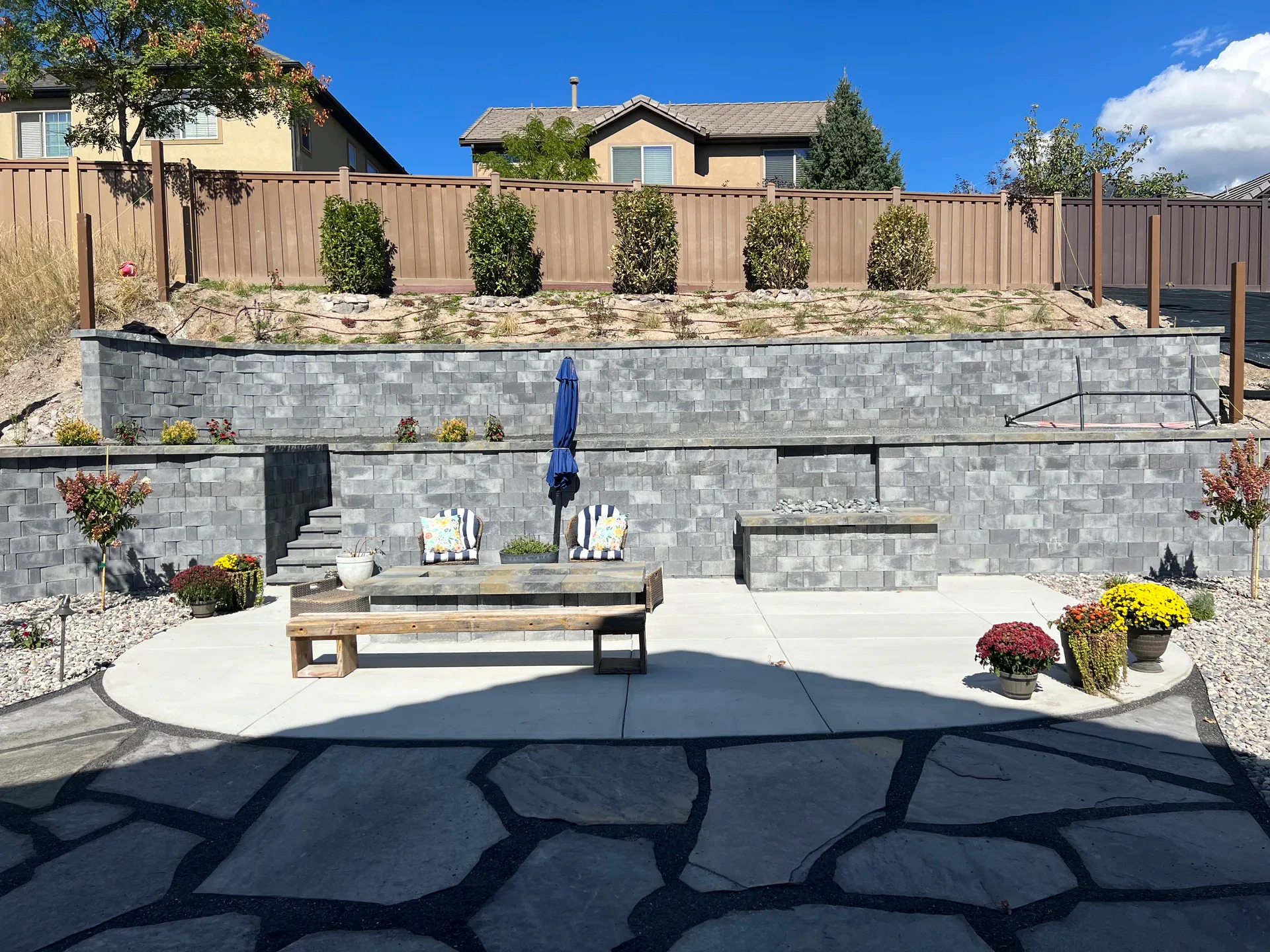 Belgard retaining wall with flagstone hardscape in Draper, Utah