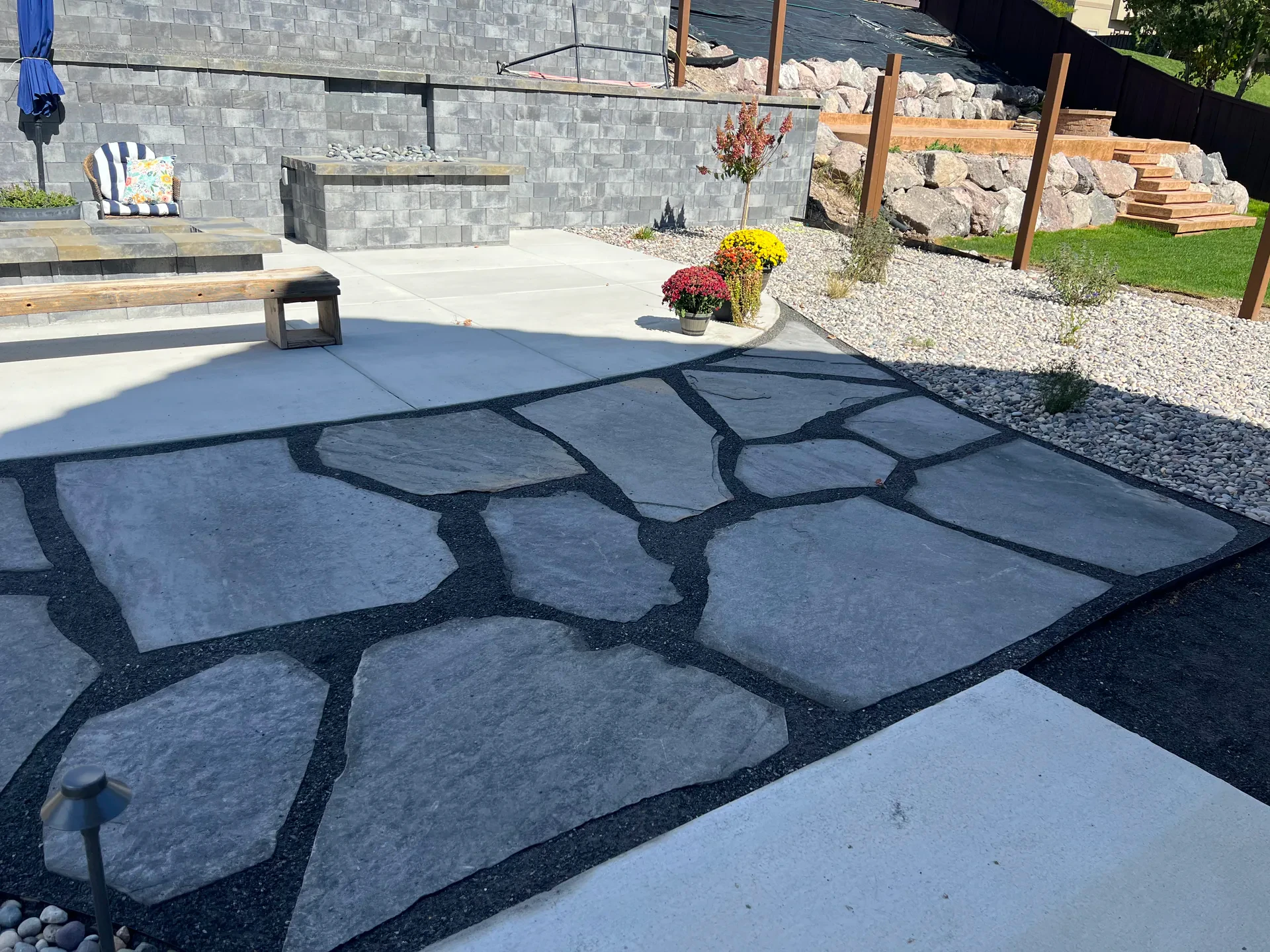 Modern flagstone patio detail in a Draper, Utah backyard