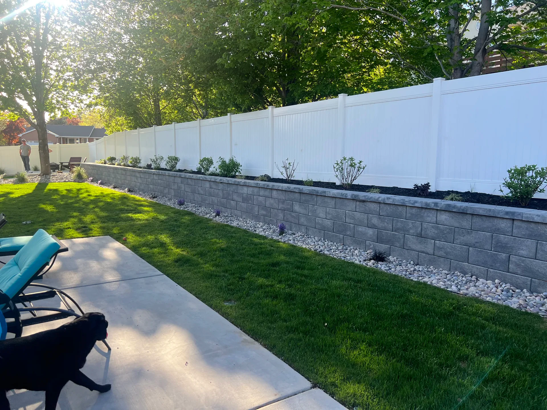 Belgard retaining wall with decorative cobble and planting beds, Sandy Utah
