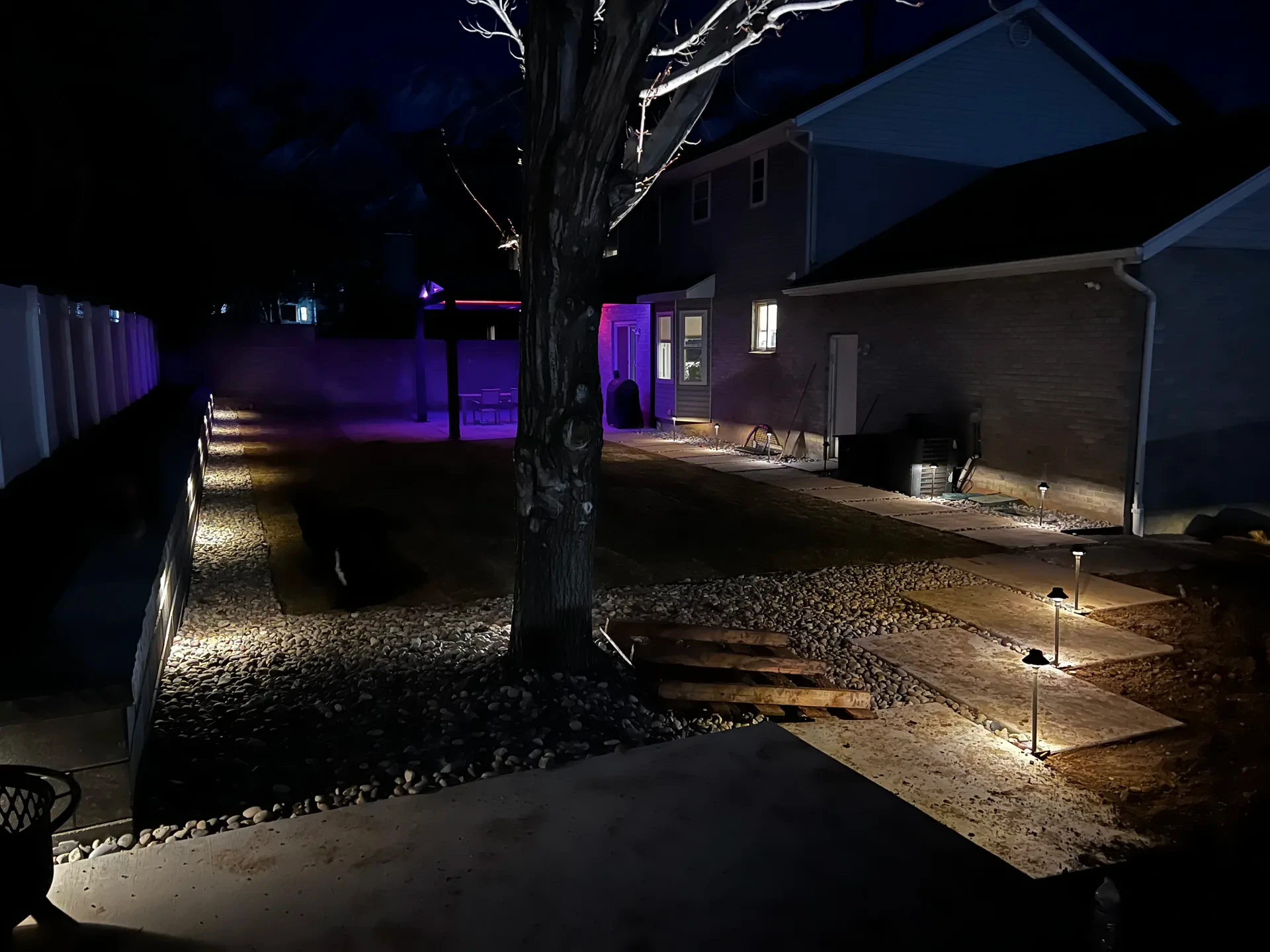Low-voltage path lighting illuminating decorative stone walkway, Sandy Utah
