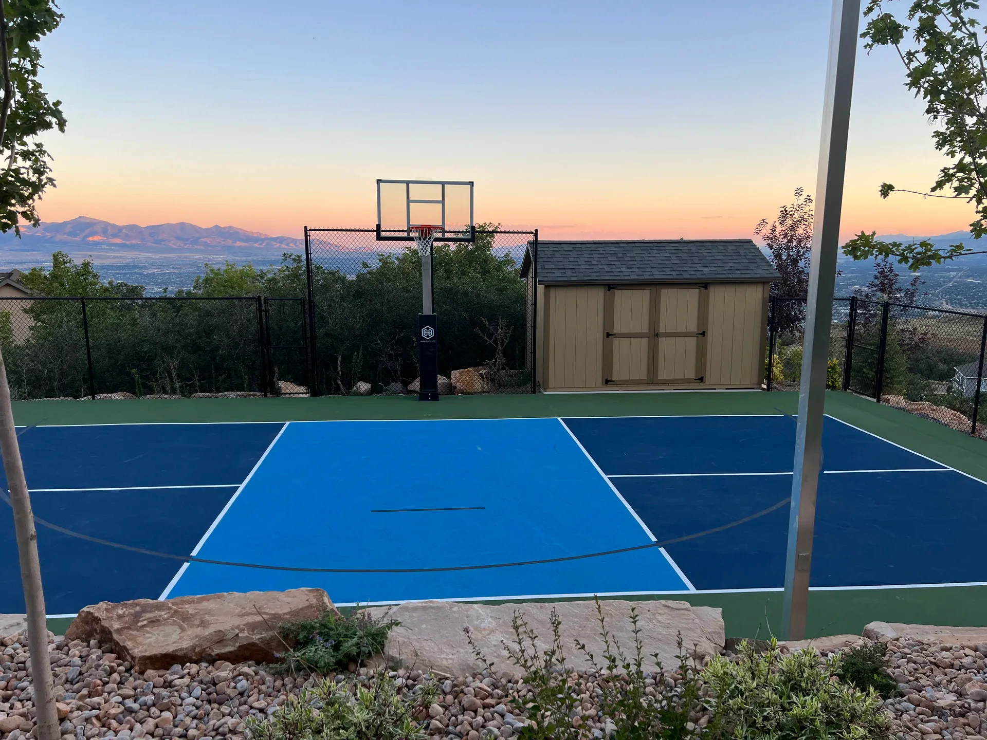 Backyard sport court with mountain valley sunset view in Suncrest, Draper Utah