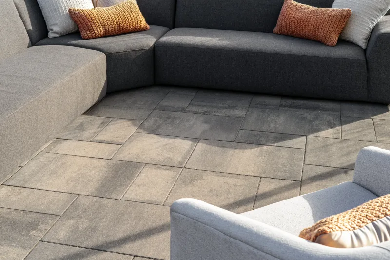 Belgard Dimensions 12 Newport Gray patio with Dimensions 6x9 Midnight accent and Artforms wall — manufacturer inspiration.