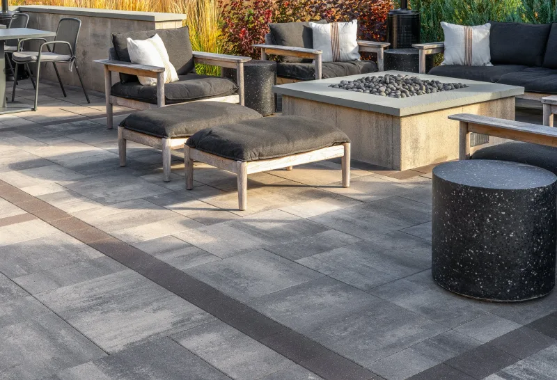 Belgard Dimensions 12 Newport Gray patio with Artforms wall system — manufacturer inspiration.
