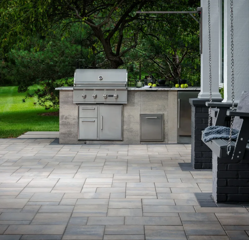 Belgard Artforms outdoor kitchen surround with Dimensions 12 and 6x9 paver floor and built-in grill — manufacturer inspiration.
